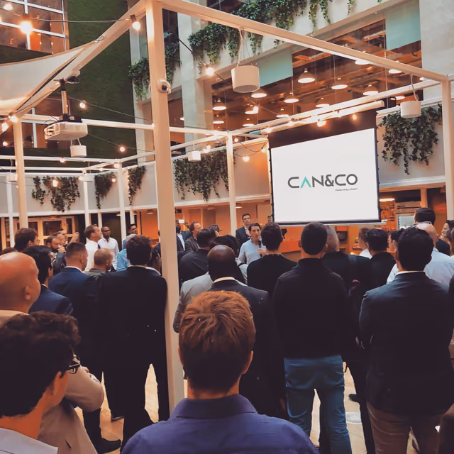 Can & Co talk to a standing audience